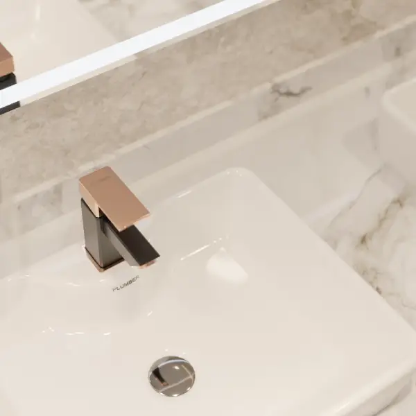 Geometric Plumber Bathware designer basin faucet in a two-tone metallic finish