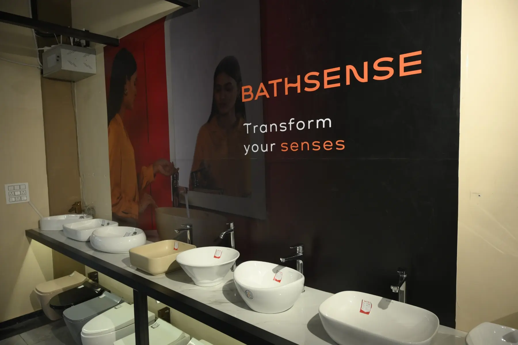 BathSense countertop basins and faucets arranged in The Build Mart Bikaner showroom