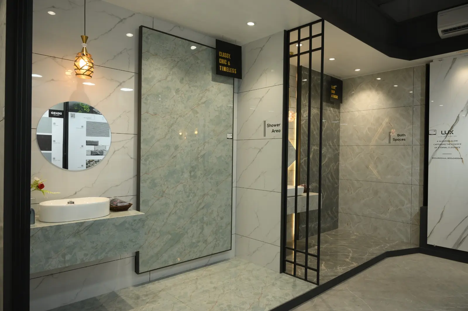 Aqua-toned marble-look Somany tiles displayed in a bathroom setting at The Build Mart